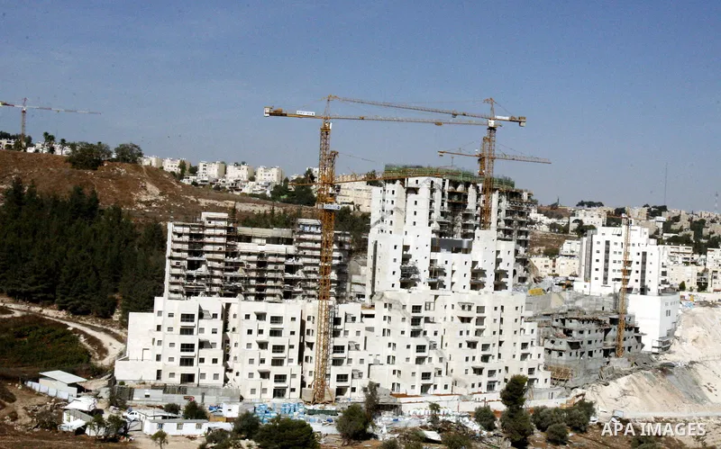 A part of work in Jewish settlement of Harmoun Hanatsave near the Arab neighbourhood of Ras al-Amud in Jerusalem on Oct. 30,2012. The Israeli occupation authority's approved to construct nearly 800 new settlement units i...