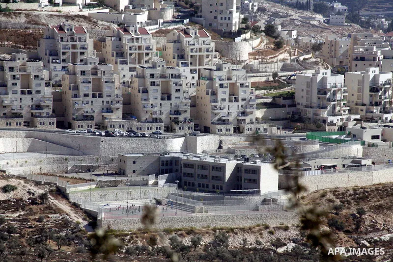 A part of work in Jewish settlement of Harmoun Hanatsave near the Arab neighbourhood of Ras al-Amud in Jerusalem on Oct. 30,2012. The Israeli occupation authority's approved to construct nearly 800 new settlement units i...