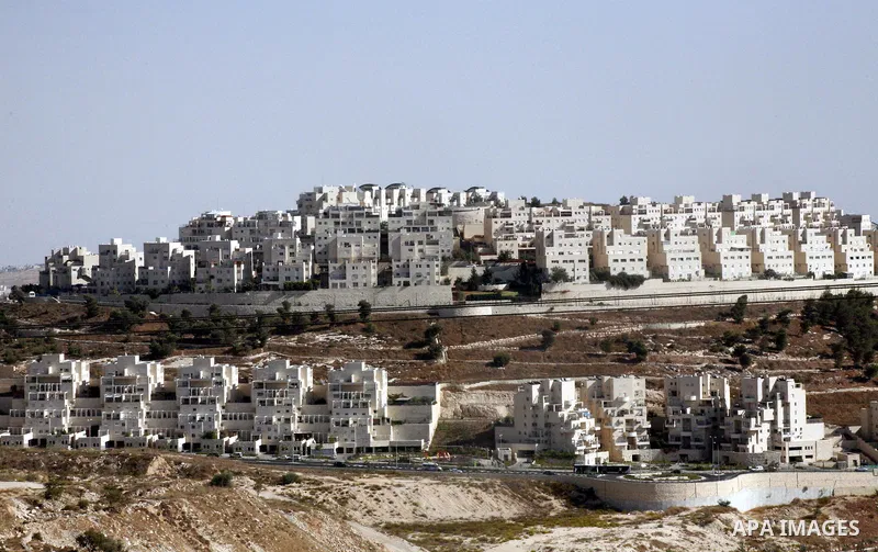 A part of work in Jewish settlement of Harmoun Hanatsave near the Arab neighbourhood of Ras al-Amud in Jerusalem on Oct. 30,2012. The Israeli occupation authority's approved to construct nearly 800 new settlement units i...