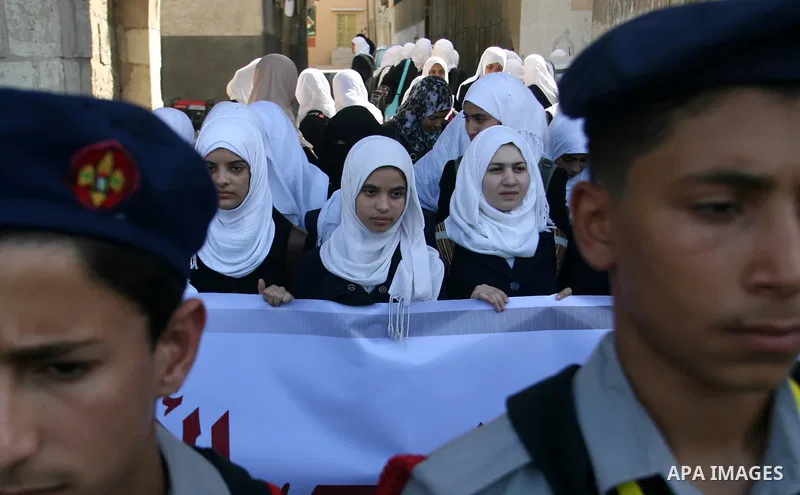 Palestinian students participate a protest on the massacre of Khan Younis 1956" in Khan Younis in southern Gaza city, on November 03, 2012. Organized Khan Younis Municipality in cooperation with the "Committee for commem...
