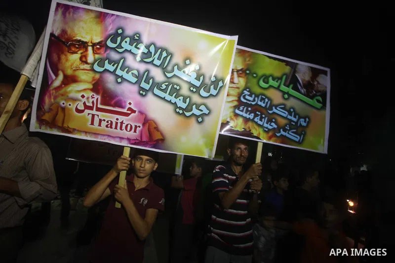 Hamas supporters attend a rally against Palestinian President Mahmoud Abbas in Jabalya in the northern Gaza Strip November 3, 2012. Abbas made a rare if symbolic concession to Israel on Thursday, saying he had no permane...