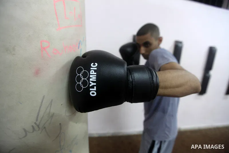 Palestinian Ahmed Quffa performs training at a boxing hall in Gaza city on 5 November 2012. Quffa received an official invitation from the French boxing organization to be professional in France, Quffa also got the recor...
