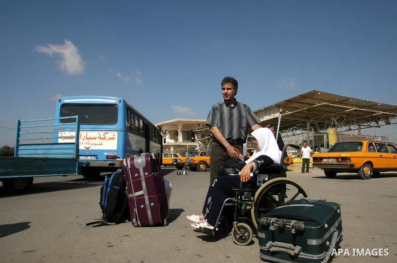 Palestinian pilgrims arrive the Rafah border crossing into Gaza Strip, in the southern Gaza strip town of Rafah on Nov. 07, 2012 . Hundreds of Palestinian pilgrims will cross into Gaza Strip on their way from Saudi Arabi...