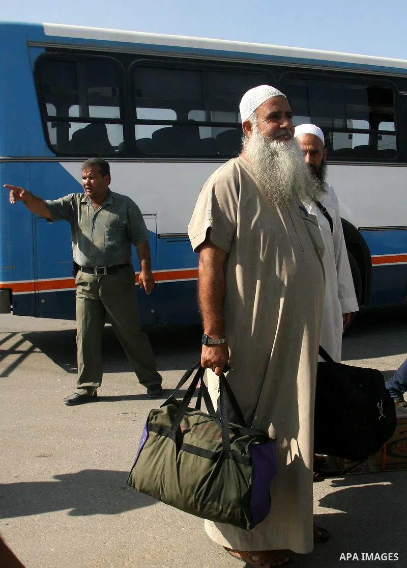 Palestinian pilgrims arrive the Rafah border crossing into Gaza Strip, in the southern Gaza strip town of Rafah on Nov. 07, 2012 . Hundreds of Palestinian pilgrims will cross into Gaza Strip on their way from Saudi Arabi...