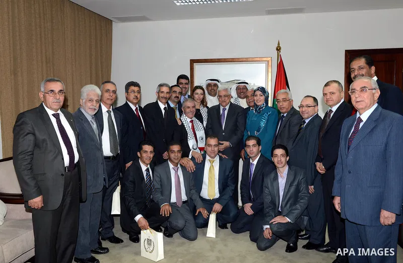 Palestinian President Mahmoud Abbas meets with the delegation of the Union of Arab Accountants, in the West Bank city of Ramallah on November 7, 2012. Photo by Thaer Ganaim