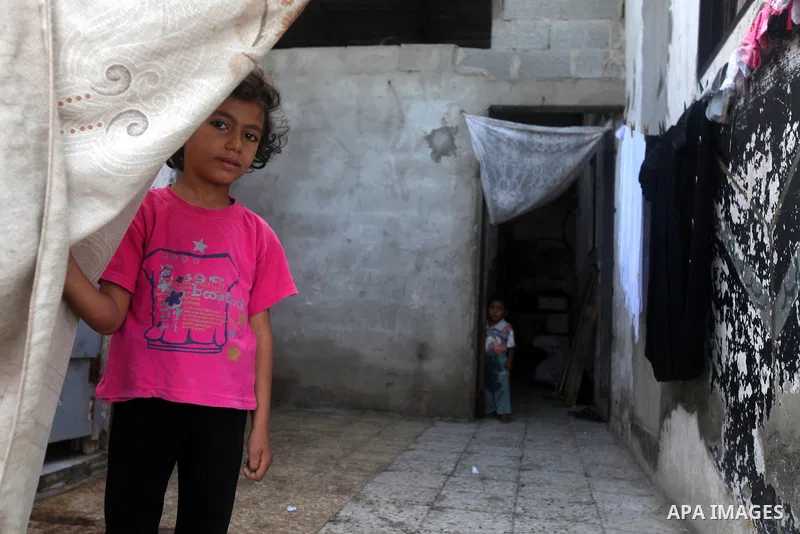 A Palestinian poor family live at the Shati Palestinian refugee camp in Gaza City on November 8, 2012. Photo by Majdi Fathi