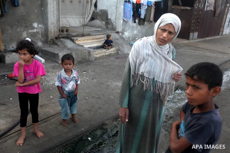 A Palestinian poor family live at the Shati Palestinian refugee camp in Gaza City on November 8, 2012. Photo by Majdi Fathi