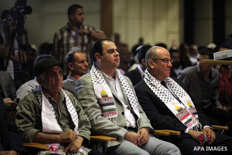 Members of the Egyptian Cinematic Syndicate attend the ceremony of the first show of the Palestinian-Egyptian Film "Lover of Rifle" in Gaza on November 8, 2012. Lover of Rifle is the first joint movie between Palestinian...