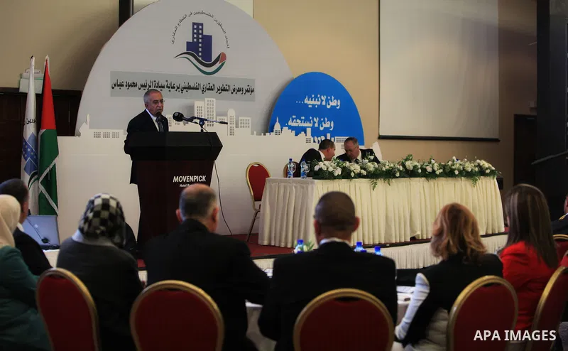 Palestinian Prime Minister Salam Fayyad, speaks during the opening exhibition developer Palestinian, in the West Bank city of Ramallah, on Nov. 10, 2012. Photo by Mustafa Abu Dayeh