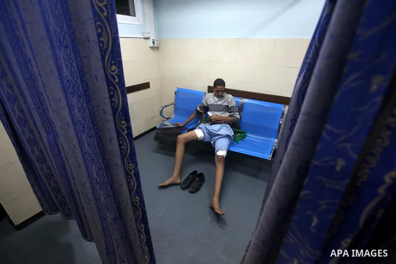 A wounded Palestinian arrives at a hospital in Gaza City following Israeli shelling November 10, 2012. Israeli tank shells killed at least two Palestinians and wounded 20 in the Gaza Strip on Saturday after an apparent a...
