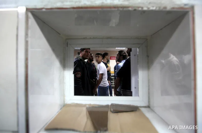 A Palestinian man reacts at a hospital in Gaza City following Israeli shelling November 10, 2012. Israeli tank shells wounded at least 16 Palestinians in the Gaza Strip on Saturday after an apparent attack on an Israeli...