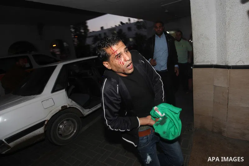 A wounded Palestinian arrives at a hospital in Gaza City following Israeli shelling November 10, 2012. Israeli tank shells killed at least two Palestinians and wounded 20 in the Gaza Strip on Saturday after an apparent a...