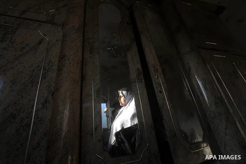 Palestinians inspect damage in their house damaged in an Israeli air strike in Gaza City November 11, 2012. An Israeli air strike killed a Palestinian militant in the Hamas-governed Gaza Strip on Sunday as a surge in cro...