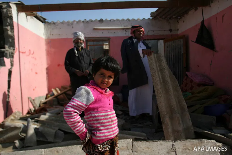 Palestinians inspect the damage to their home following an Israeli military air strike in Rafah town in the southern Gaza Strip, on November 11, 2012. The flare-up which began November 10, was one of the most serious sin...