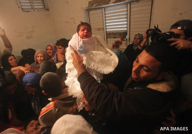 Palestinian women grieve during the funeral of Matar Abu Ata, 20, killed in an Israeli airstrike overnight, in Gaza City, Sunday, Nov. 11, 2012. While cross-border fighting is a common occurrence, hostilities spiraled sh...
