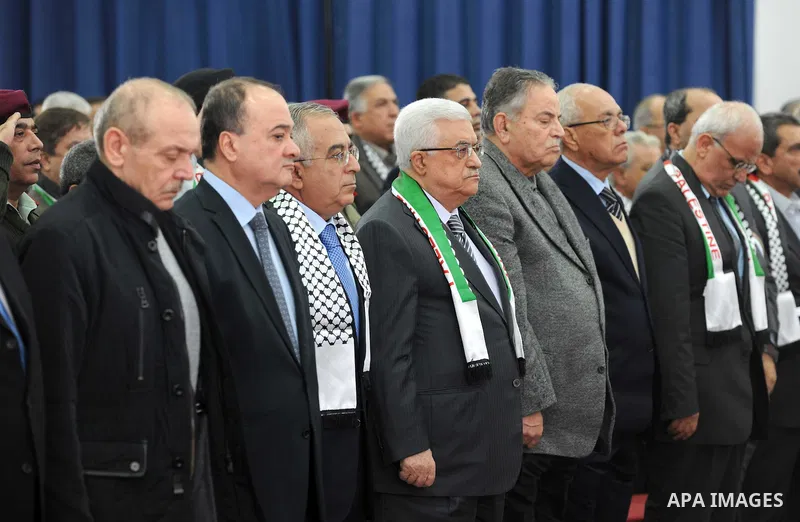 Palestinian President Mahmud Abbas attends a ceremony marking the eighth anniversary of the death of the late leader Yasser Arafat, in the West Bank city of Ramallah on November 11, 2012. Palestinians are coordinating wi...
