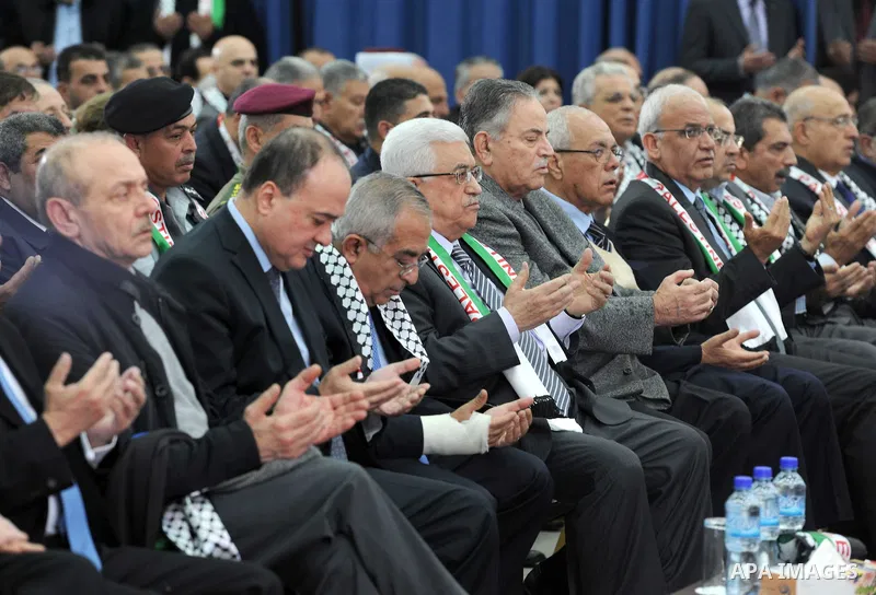 Palestinian President Mahmud Abbas attends a ceremony marking the eighth anniversary of the death of the late leader Yasser Arafat, in the West Bank city of Ramallah on November 11, 2012. Palestinians are coordinating wi...