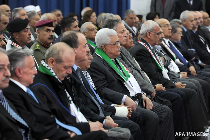Palestinian President Mahmud Abbas attends a ceremony marking the eighth anniversary of the death of the late leader Yasser Arafat, in the West Bank city of Ramallah on November 11, 2012. Palestinians are coordinating wi...