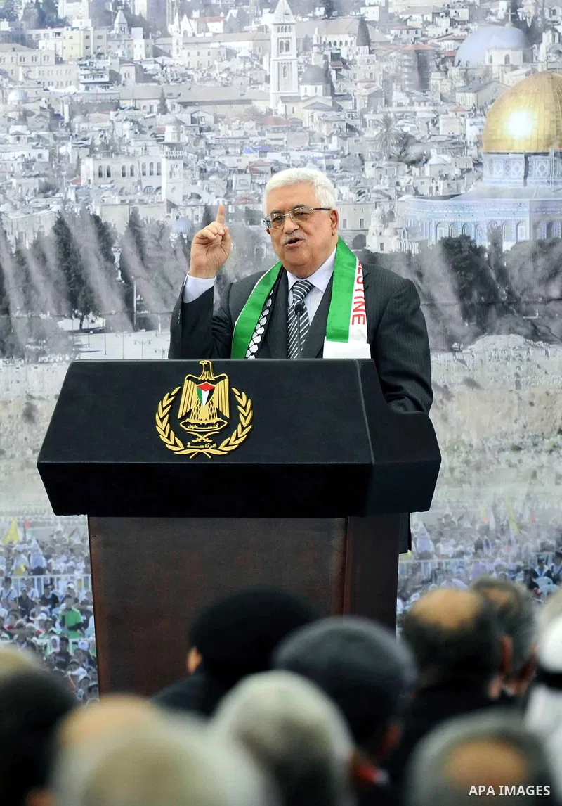Palestinian President Mahmud Abbas delivers a speech to mark the eighth anniversary of the death of the late leader Yasser Arafat, in the West Bank city of Ramallah on November 11, 2012. Palestinians are coordinating wit...