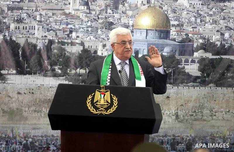 Palestinian President Mahmud Abbas delivers a speech to mark the eighth anniversary of the death of the late leader Yasser Arafat, in the West Bank city of Ramallah on November 11, 2012. Palestinians are coordinating wit...