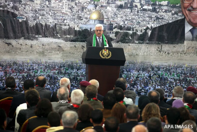 Palestinian President Mahmud Abbas delivers a speech to mark the eighth anniversary of the death of the late leader Yasser Arafat, in the West Bank city of Ramallah on November 11, 2012. Palestinians are coordinating wit...