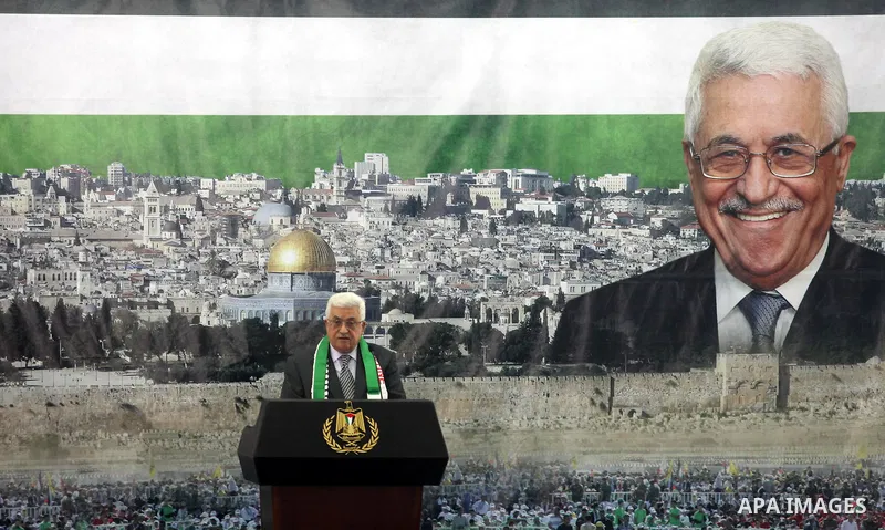 Palestinian President Mahmud Abbas delivers a speech to mark the eighth anniversary of the death of the late leader Yasser Arafat, in the West Bank city of Ramallah on November 11, 2012. Palestinians are coordinating wit...