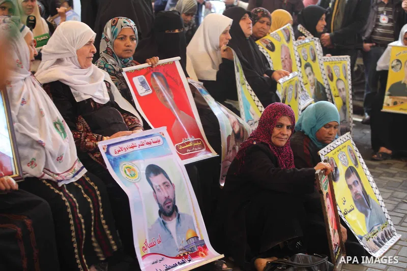 Palestinians woman participate a protest in front of the International Red Cross building in Gaza City, to calling for the release from Palestinian prisoners in Israeli jails and in support of prisoners on hunger strike,...