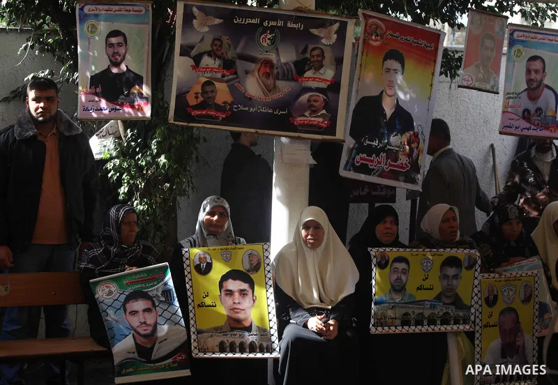 Palestinians woman participate a protest in front of the International Red Cross building in Gaza City, to calling for the release from Palestinian prisoners in Israeli jails and in support of prisoners on hunger strike,...