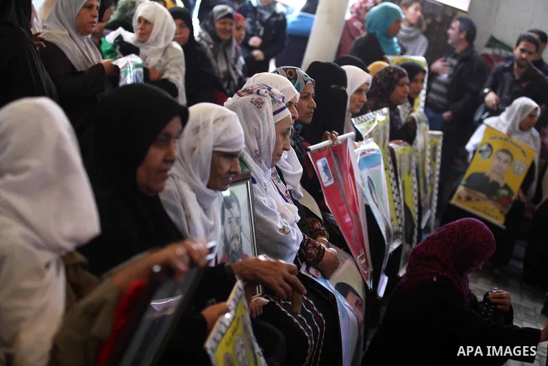 Palestinians woman participate a protest in front of the International Red Cross building in Gaza City, to calling for the release from Palestinian prisoners in Israeli jails and in support of prisoners on hunger strike,...