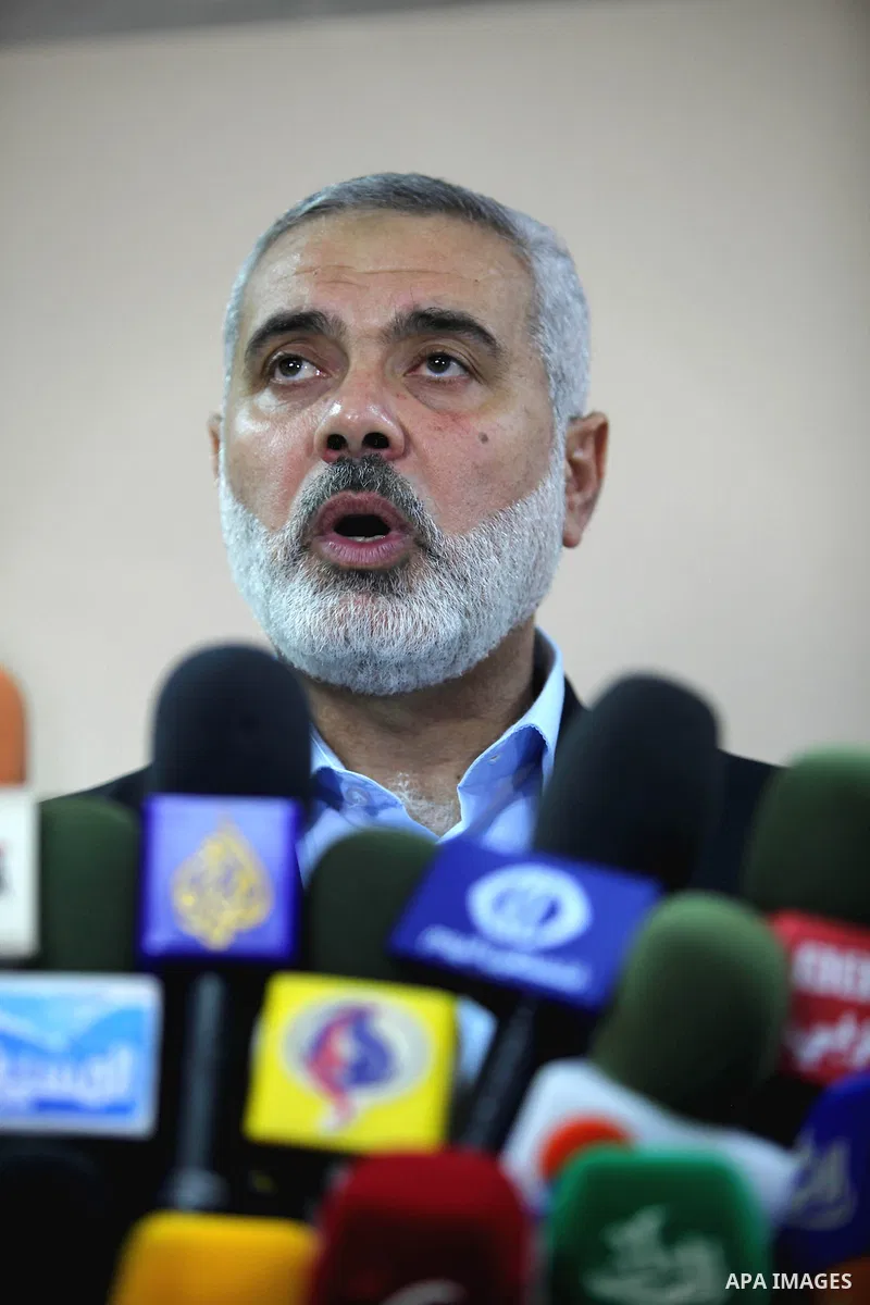 Palestinian Prime Minister in Gaza strip Ismail Haniyeh speaks to media during a visit to injured by Israeli airstrikes on Gaza strip at al-Shifa hospital in Gaza on November 13, 2012. Tensions rose sharply on Saturday w...