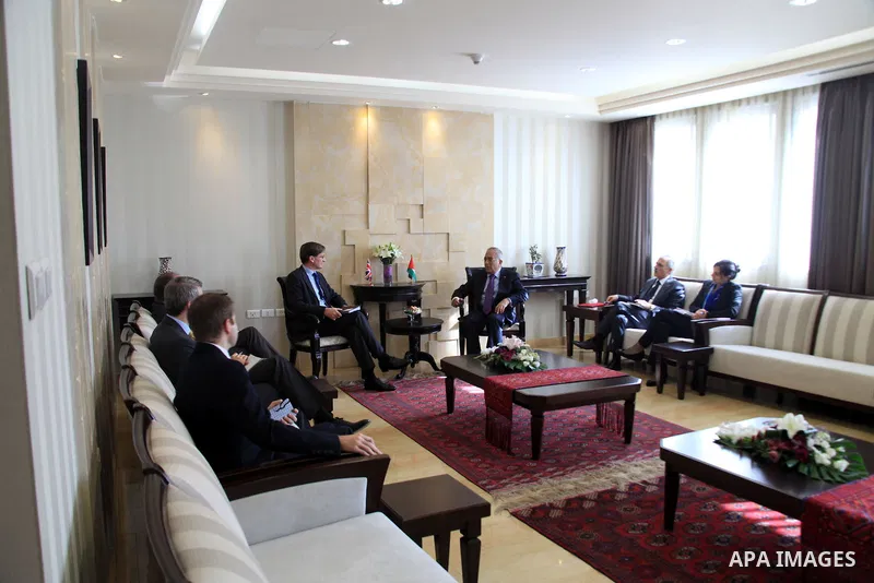 Palestinian Prime Minister Salam Fayyad meets with the British attorney general, Dominic Grieve, in the West Bank city of Ramallah on November 14, 2012. Photo by Mustafa Abu Dayeh