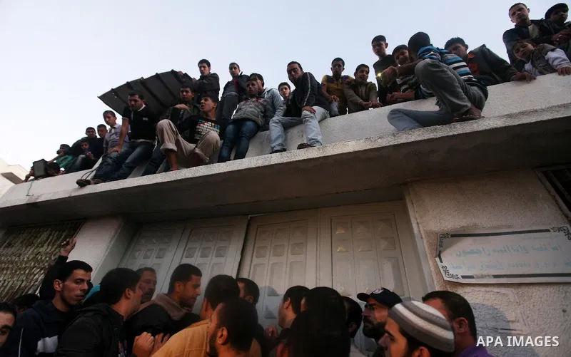 Palestinians gather at al-Shifa hospital in Gaza City following an Israeli air strike on November 14, 2012. An Israeli strike that killed Hamas's top commander in Gaza is only "the beginning" of an operation to target mi...