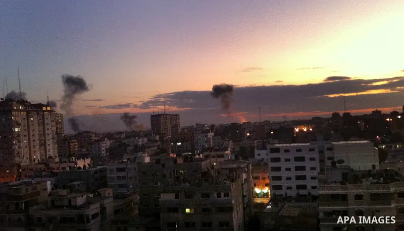 Smoke rises after an Israeli air strike in the northern Gaza Strip November 14, 2012. Israel killed the military commander of the Islamist group Hamas in a missile strike on the Gaza Strip on Wednesday and launched air r...