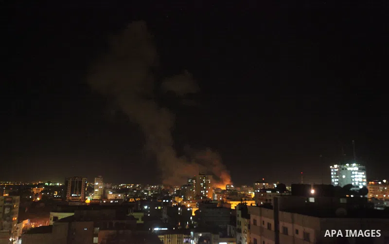 Smoke rises after an Israeli air strike in the northern Gaza Strip November 14, 2012. Israel killed the military commander of the Islamist group Hamas in a missile strike on the Gaza Strip on Wednesday and launched air r...