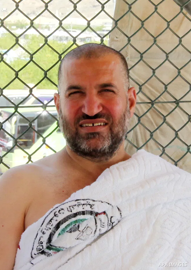 (FILES) Ahmed Al-Jaabari, top commander of Hamas armed wing Al-Qassam brigades, poses for a picture during the annual Hajj on 2012. Hamas's military chief Ahmed Al-Jaabari was killed when his car was hit by an Israeli ai...