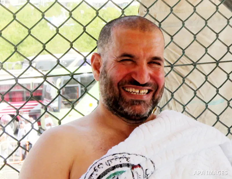 (FILES) Ahmed Al-Jaabari, top commander of Hamas armed wing Al-Qassam brigades, poses for a picture during the annual Hajj on 2012. Hamas's military chief Ahmed Al-Jaabari was killed when his car was hit by an Israeli ai...
