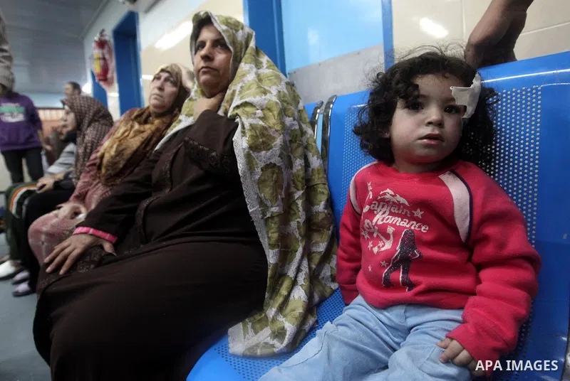 A Palestinian wounded girl waits at al-Shifa hospital following an Israeli airstrike in Gaza City, Wednesday, Nov. 14, 2012. The Israeli military said its assassination of the Hamas military commander Ahmed Jabari, marks...