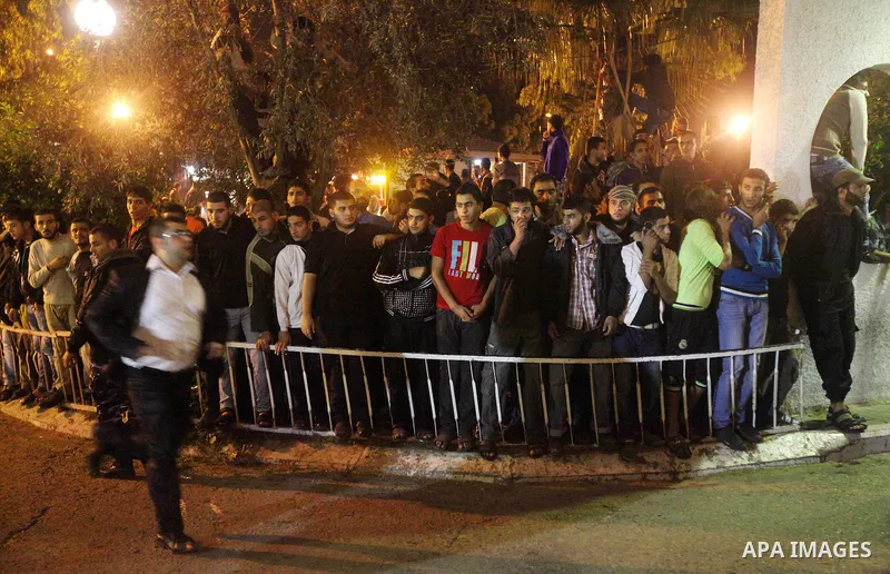 Palestinians gather at al-Shifa hospital in Gaza City following an Israeli air strike on November 14, 2012. An Israeli strike that killed Hamas's top commander in Gaza is only "the beginning" of an operation to target mi...