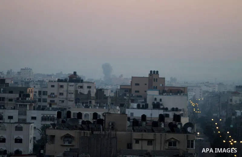 Smoke rises after an Israeli air strike in Gaza city Nov. 15, 2012. The Israeli air force continued striking Hamas targets in the Gaza Strip on Wednesday, after killing 10 people, including al-Jaabari and at least five c...