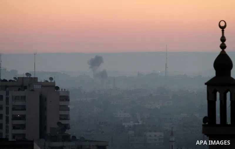 Smoke rises after an Israeli air strike in Gaza city Nov. 15, 2012. The Israeli air force continued striking Hamas targets in the Gaza Strip on Wednesday, after killing 10 people, including al-Jaabari and at least five c...