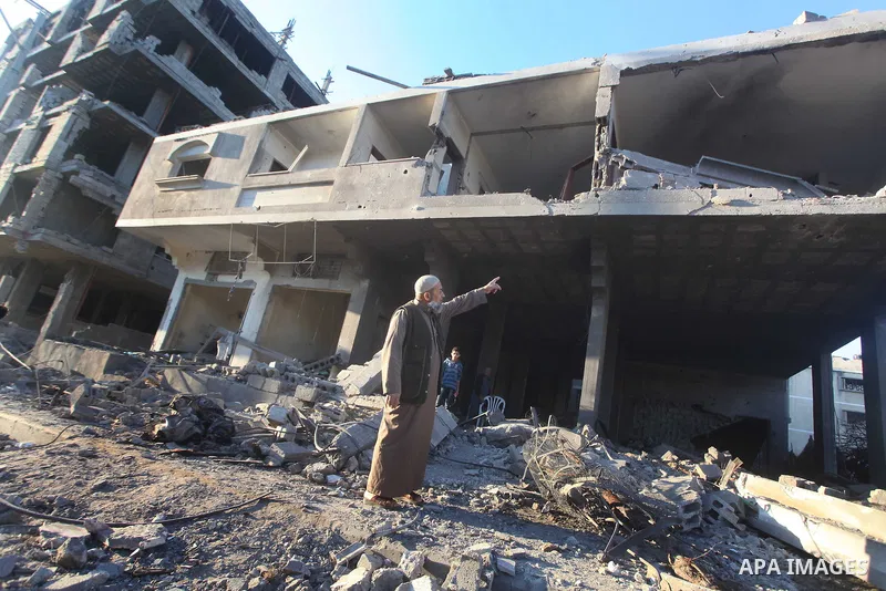 Palestinians check their damaged house after Israeli air strikes in Gaza City November 15, 2012. Israel exchanged the fiercest fire with Hamas in years after assassinating its military mastermind and threatening a wider...