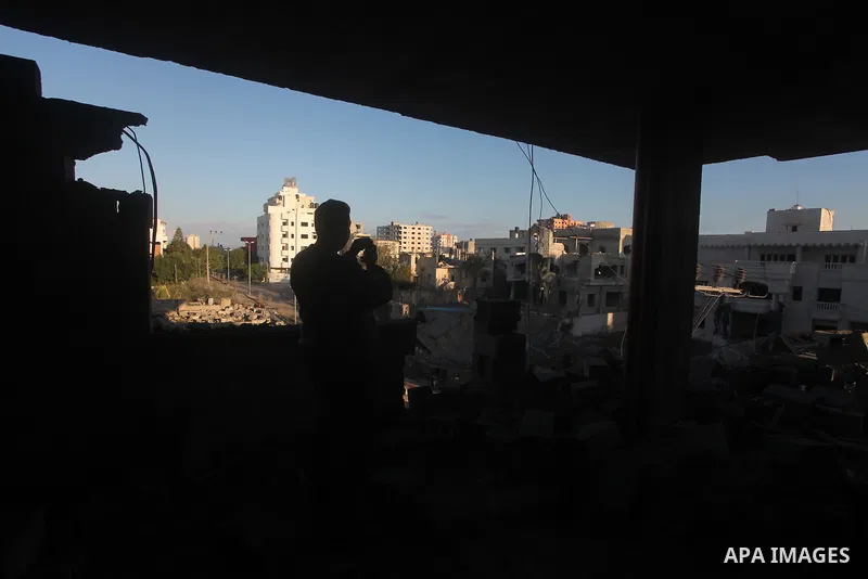Palestinians check their damaged house after Israeli air strikes in Gaza City November 15, 2012. Israel exchanged the fiercest fire with Hamas in years after assassinating its military mastermind and threatening a wider...