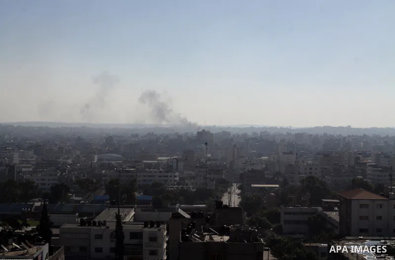 Smoke rises over the Gaza Strip, 15 November 2012. Israel carried out attacks on Gaza with 'hundreds' of targets hit since it began midweek, with the killing of Hamas military commander-in-chief Ahmed Ja'abari, an army s...