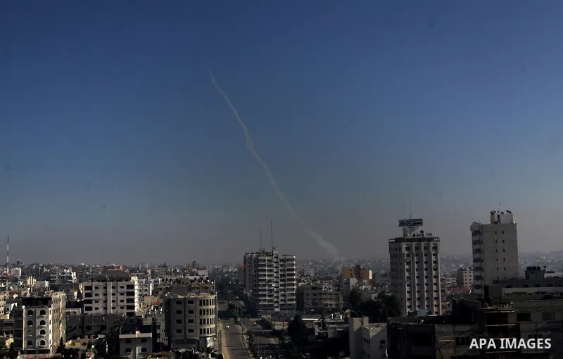 Rockets launched by Palestinian militants towards Israel make their way from the Gaza city, Thursday, Nov. 15, 2012. Photo by Naaman Omar