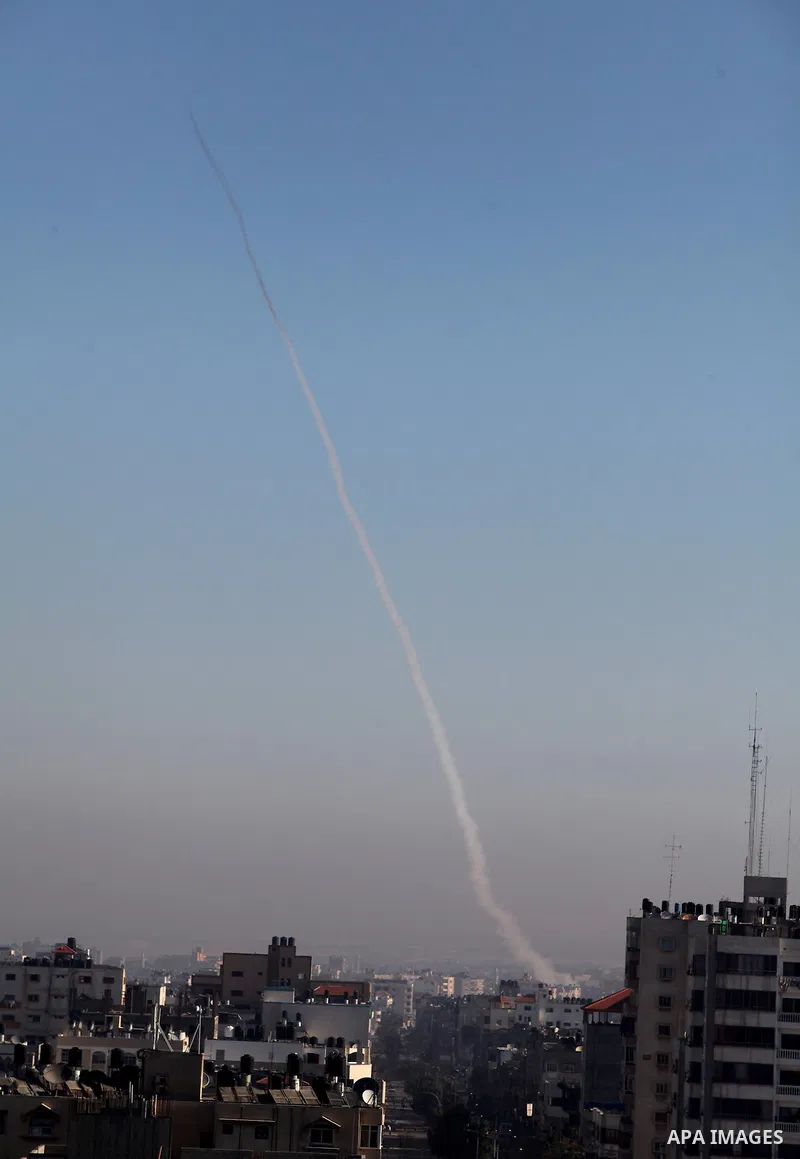Rockets launched by Palestinian militants towards Israel make their way from the Gaza city, Thursday, Nov. 15, 2012. Photo by Ashraf Amra