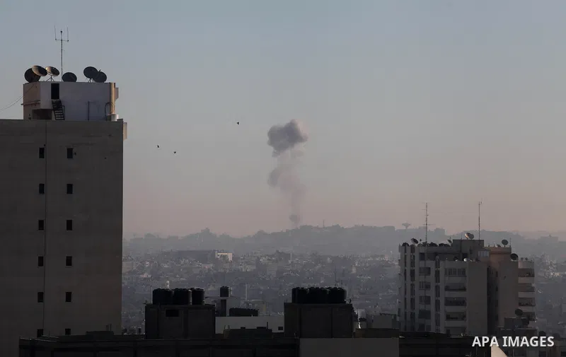 Smoke rises after an Israeli air strike in Gaza city Nov. 15, 2012. The Israeli air force continued striking Hamas targets in the Gaza Strip on Wednesday, after killing 10 people, including al-Jaabari and at least five c...