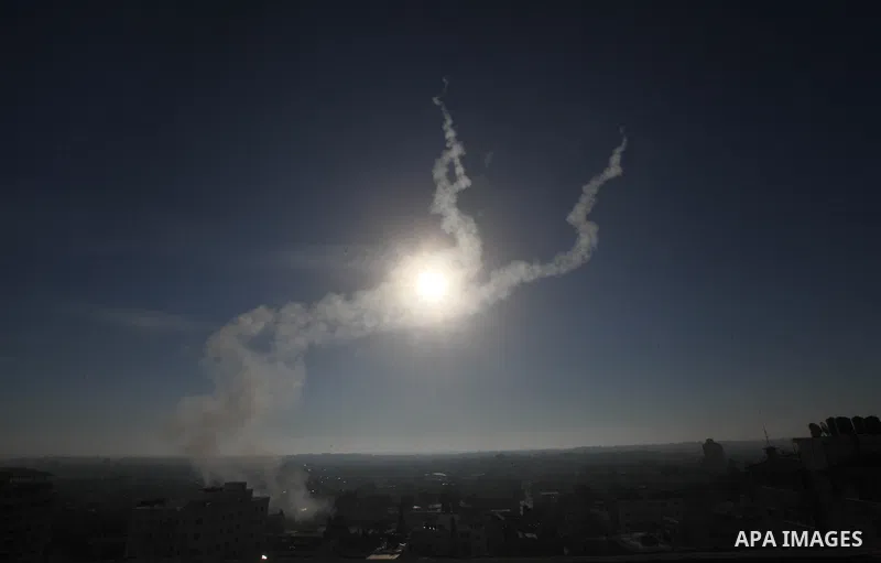 Rockets launched by Palestinian militants towards Israel make their way from the Gaza city, Thursday, Nov. 15, 2012. Photo by Ashraf Amra