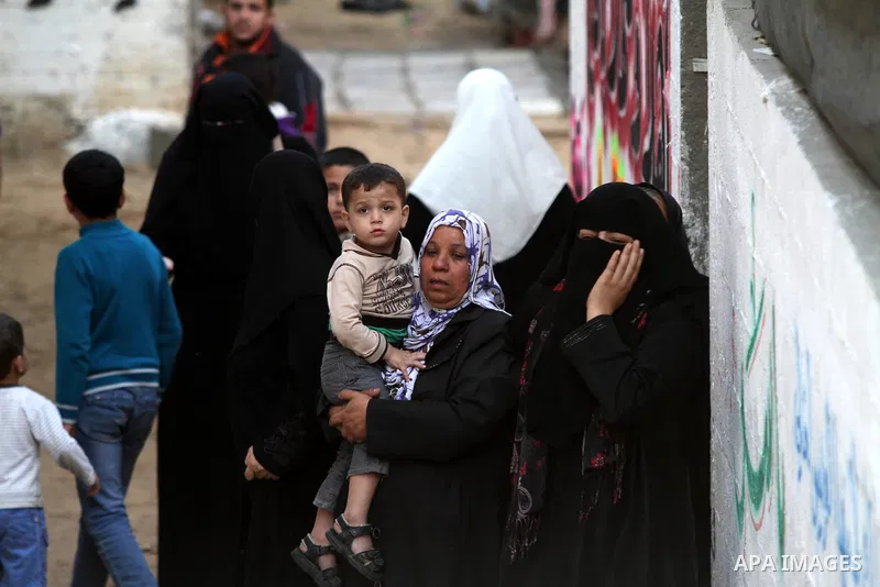 Palestinian women mourn during the funeral of Ahmad Jaabari, head of the military wing of the Hamas movement, the Ezzedin Qassam Brigades in Gaza City, on November 15, 2012. Tensions between Israel and Gaza have sparked...