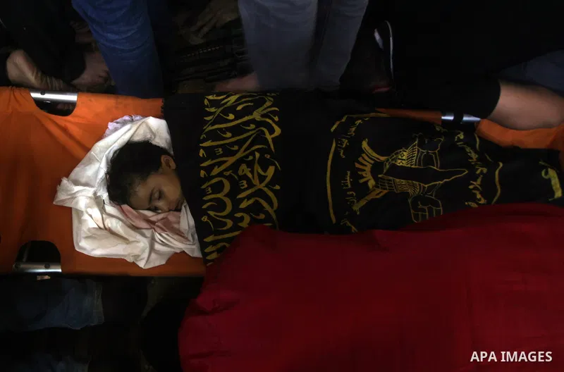 Palestinian mourners carry the body of girl of during her funeral in Gaza City, on November 15, 2012. Tensions between Israel and Gaza have sparked a furious response from Egypt's Islamist administration, which has close...