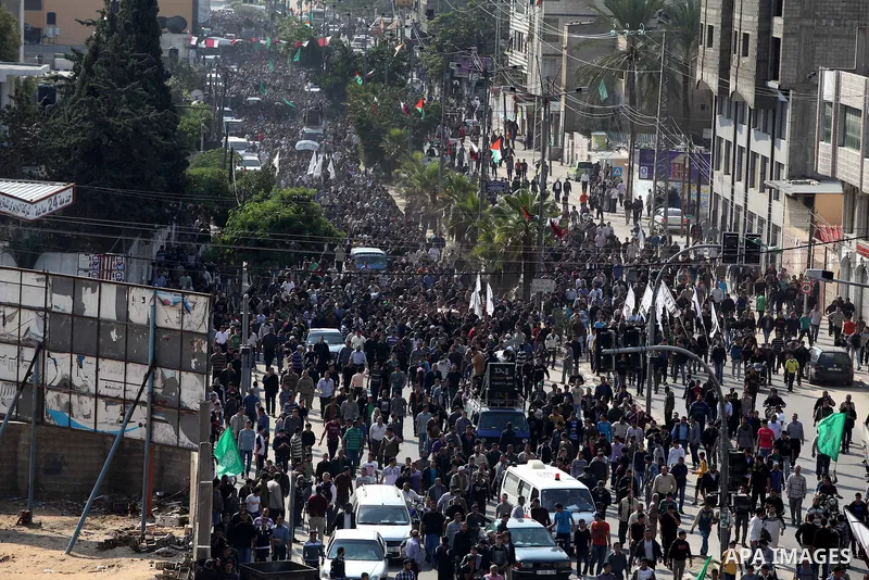 Palestinian mourners carry the body of Ahmad Jaabari, head of the military wing of the Hamas movement, the Ezzedin Qassam Brigades, during his funeral in Gaza City, on November 15, 2012. Tensions between Israel and Gaza...